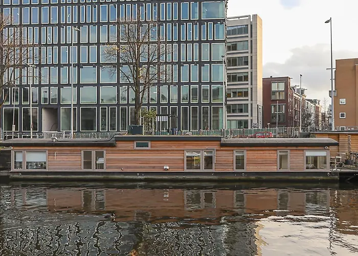 Houseboat Next To Amstel Hotel Amsterdam