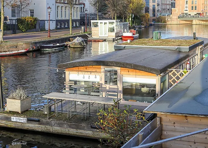Houseboat Next To Amstel Hotel Amsterdam